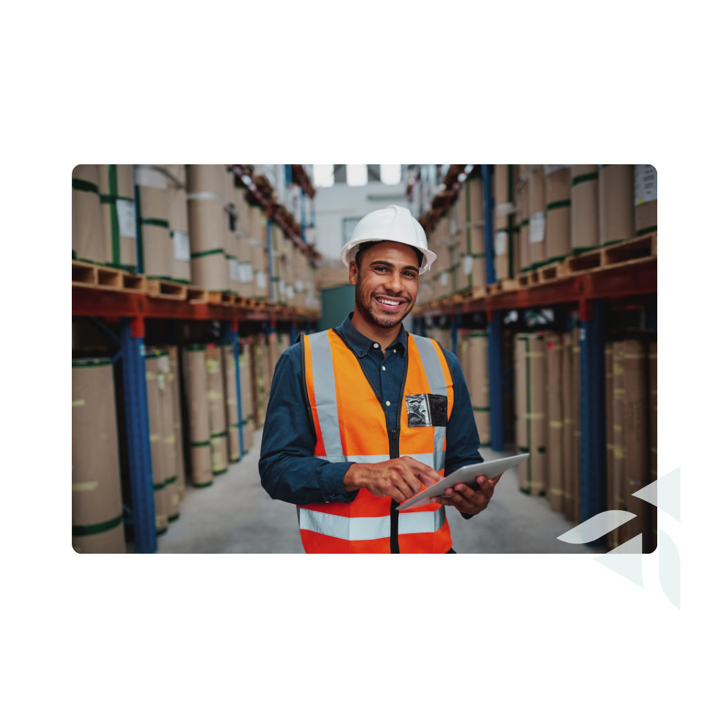 male factory manager using digital tablet